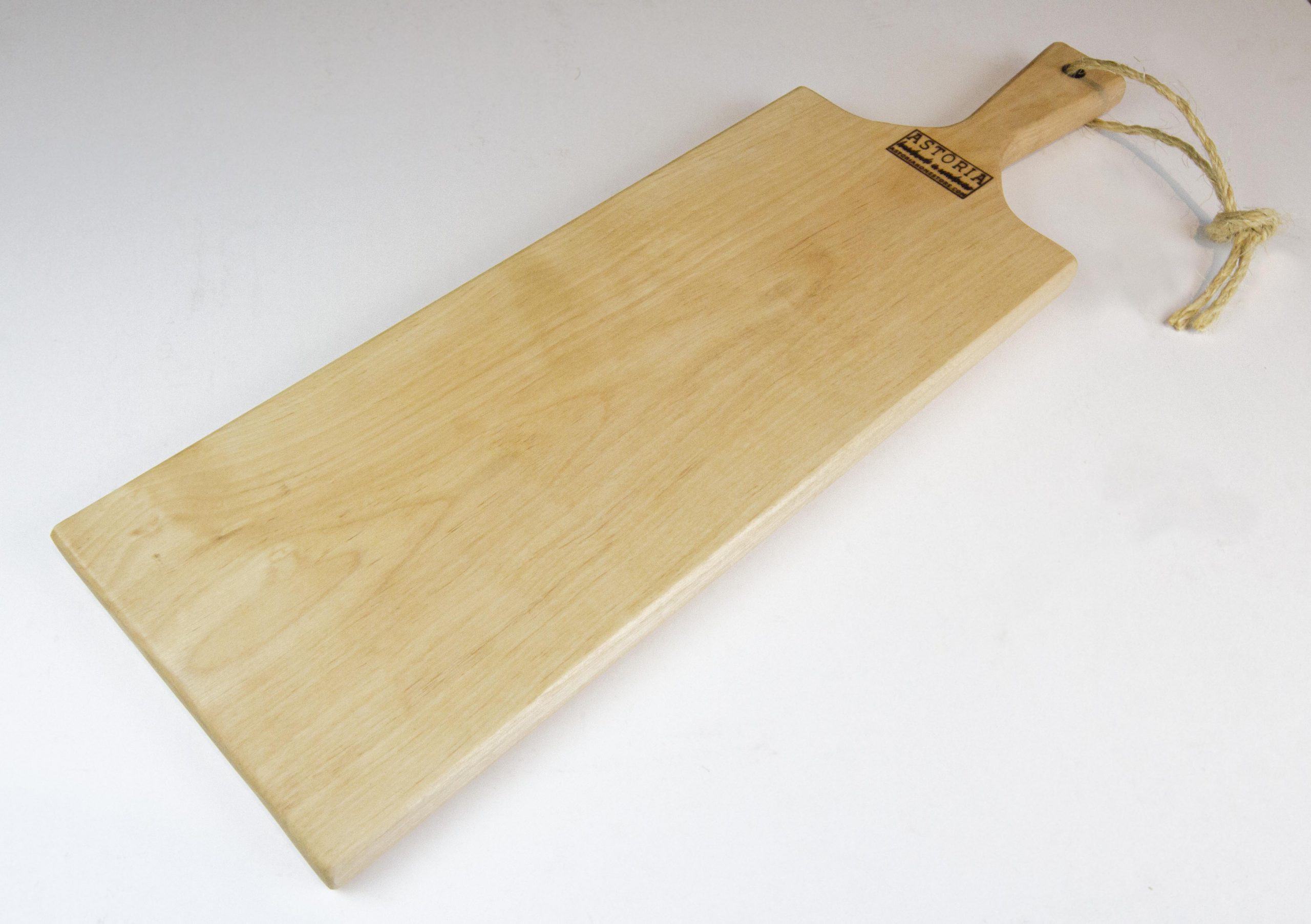 https://www.astoriahomestore.com/wp-content/uploads/2020/02/Birch-Hardwood-Medium-Long-Charcuterie-Board-Hand-Crafted-in-Mendocino-Village-Wood-Paddle-Cutting-Board-Jute-Twine-Handle-Side-Profile-scaled.jpg